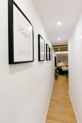 Cama o camas de una habitación en Estupendo Piso de 2 dormitorios en la Gran Vía. A/A. Wifi.
