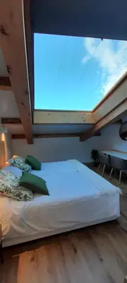 Cama o camas de una habitación en Hotel Camino de las Estrellas