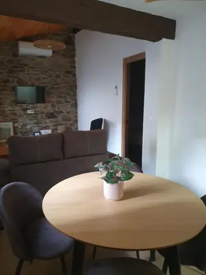 Una televisión o centro de entretenimiento en Apartamentos Callampa