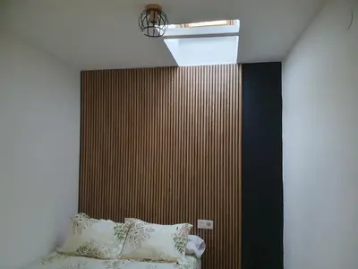Cama o camas de una habitación en Apartamentos Callampa