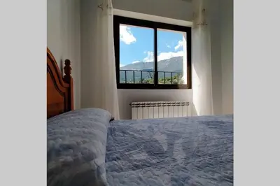 Cama o camas de una habitación en Apartamento Vistas a Gredos.
