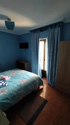 Cama o camas de una habitación en Villa Moreno Vivienda uso turístico