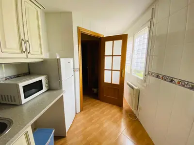 Una cocina o zona de cocina en VUT LOURDES