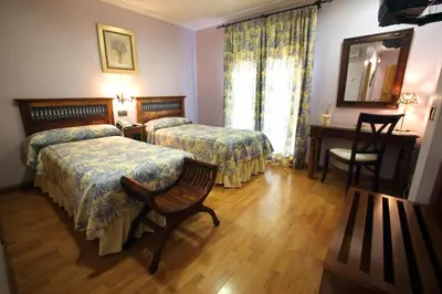 Cama o camas de una habitación en Hotel El Pentágono