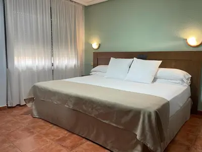 Cama o camas de una habitación en Hotel Los Kekes