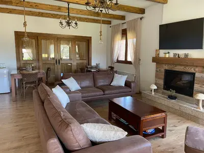 Una televisión o centro de entretenimiento en Hotel Rural - La Osa Mayor - 4 Estrellas