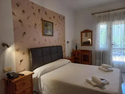 Cama o camas de una habitación en Hotel Rural El Molino