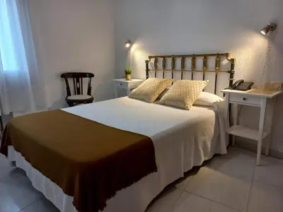 Cama o camas de una habitación en Hotel Rural El Molino