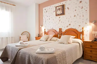 Cama o camas de una habitación en Hotel Rural El Molino