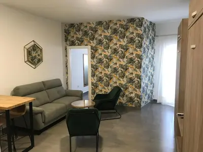 Zona de estar de Apartamentos Ad Theatrum