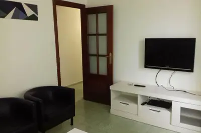 Una televisión o centro de entretenimiento en Alojamiento VuT Rupurupay B