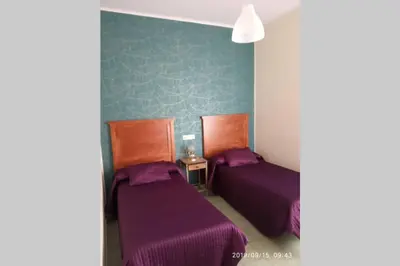 Cama o camas de una habitación en Alojamiento VuT Rupurupay B