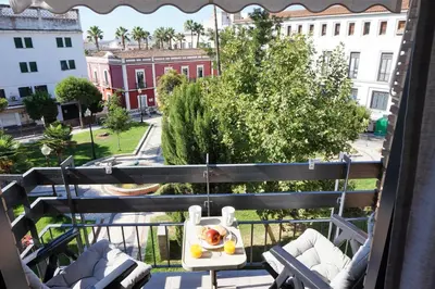 Un balcón o terraza de Apartamentos IMPLUVIUM Mérida