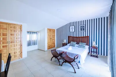 Cama o camas de una habitación en La Posada de la Gula