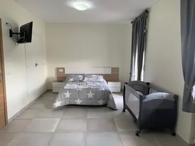 Cama o camas de una habitación en La Villa Hostal