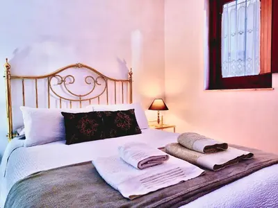 Cama o camas de una habitación en La casa de Tentenecio