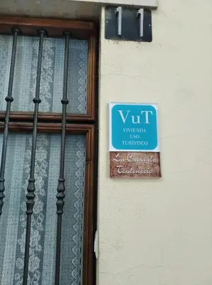 Certificado, premio, señal o documento que está expuesto en La casa de Tentenecio
