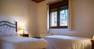 Cama o camas de una habitación en Eras del Poeta