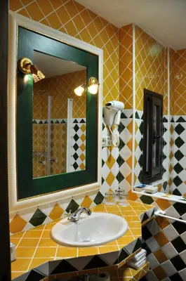 Un baño de Apartamentos Boutique Doña Maria La Brava