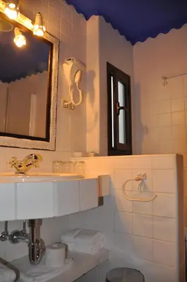 Un baño de Apartamentos Boutique Doña Maria La Brava