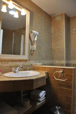 Un baño de Apartamentos Boutique Doña Maria La Brava