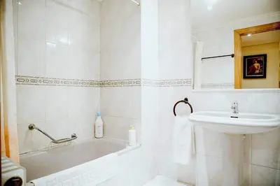 Un baño de Apartamentos GARDEN