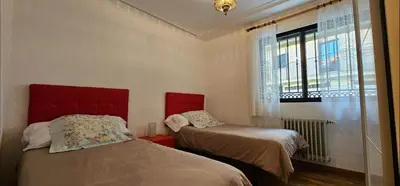 Cama o camas de una habitación en Apartamentos GARDEN