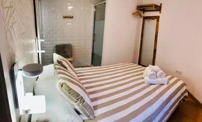Cama o camas de una habitación en El Escondite de la Muralla