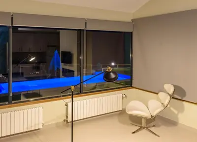 Una televisión o centro de entretenimiento en Apartamentos Rurales La Gloria de Yuste