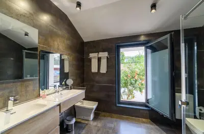 Un baño de Apartamentos Rurales La Gloria de Yuste