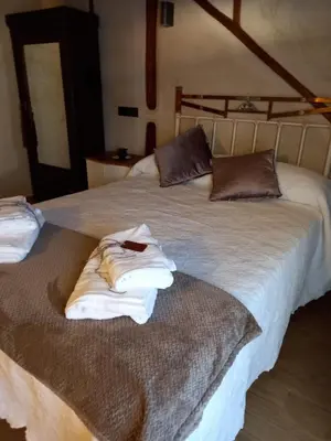 Cama o camas de una habitación en La Herrerita