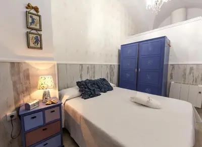 Cama o camas de una habitación en Destino Deluxe Plaza de la Audiencia