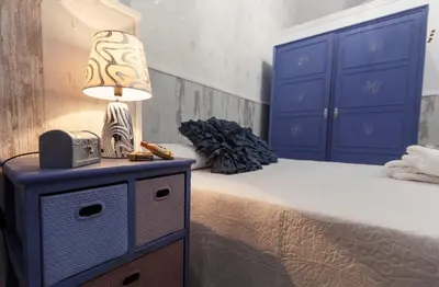 Cama o camas de una habitación en Destino Deluxe Plaza de la Audiencia