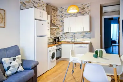 Una cocina o zona de cocina en A - Apartamento elegante con piscina compartida