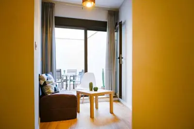 Zona de estar de A - Apartamento elegante con piscina compartida