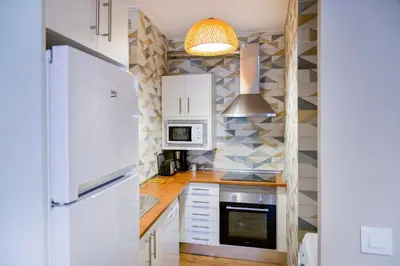 Una cocina o zona de cocina en B - Apartamento exclusivo con piscina compartida