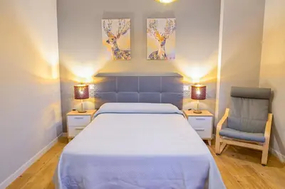 Cama o camas de una habitación en C - Apartamento moderno con piscina compartida