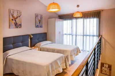 Cama o camas de una habitación en C - Apartamento moderno con piscina compartida