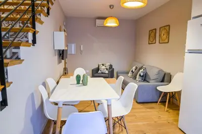 Zona de estar de C - Apartamento moderno con piscina compartida