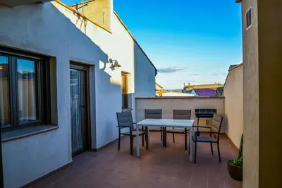 Un balcón o terraza de C - Apartamento moderno con piscina compartida