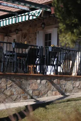 Un balcón o terraza de Una casita en el campo dentro de la ciudad