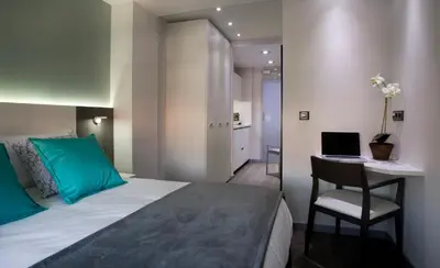 Cama o camas de una habitación en Salamanca Suite Studios