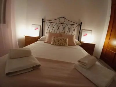 Cama o camas de una habitación en CASA PURI