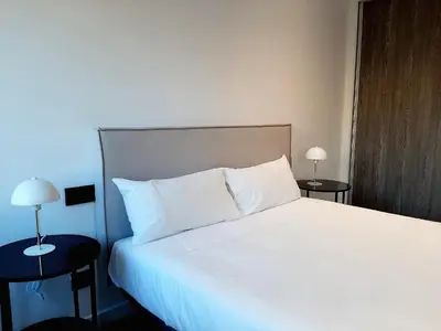 Cama o camas de una habitación en Apartamentos Celestina by gaiarooms