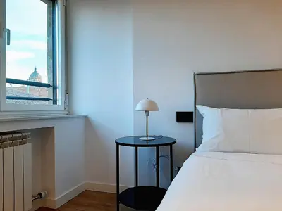 Cama o camas de una habitación en Apartamentos Celestina by gaiarooms