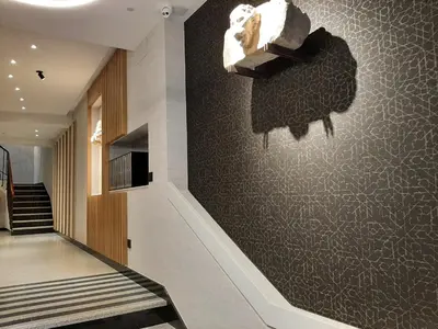 Una televisión o centro de entretenimiento en Apartamentos Celestina by gaiarooms