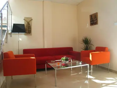 Una televisión o centro de entretenimiento en Hostal Ciudad de Cáparra