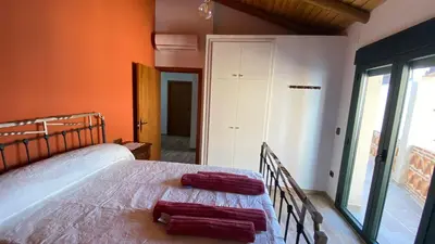 Cama o camas de una habitación en La Casa de Abajo