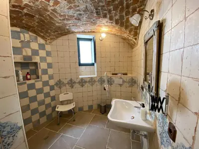 Un baño de La Casa de Abajo