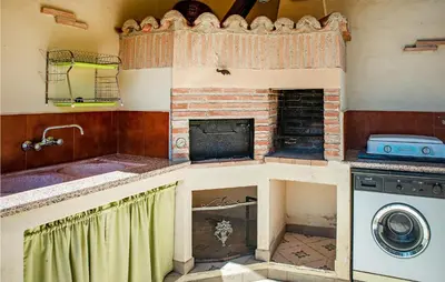 Una cocina o zona de cocina en Casita De Campo En Cáceres